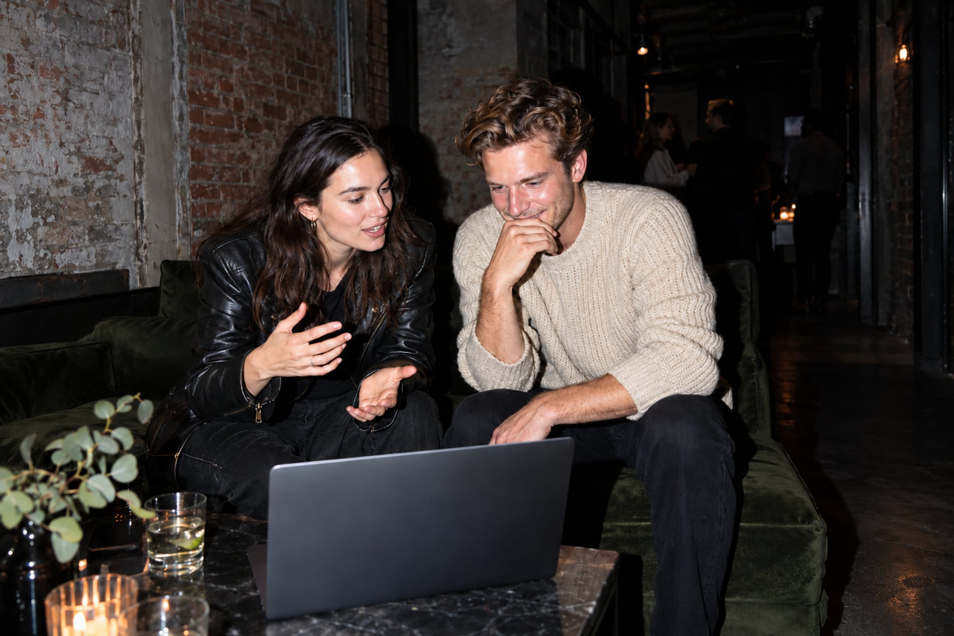 Two founders talk in a London backstage lounge after dark.